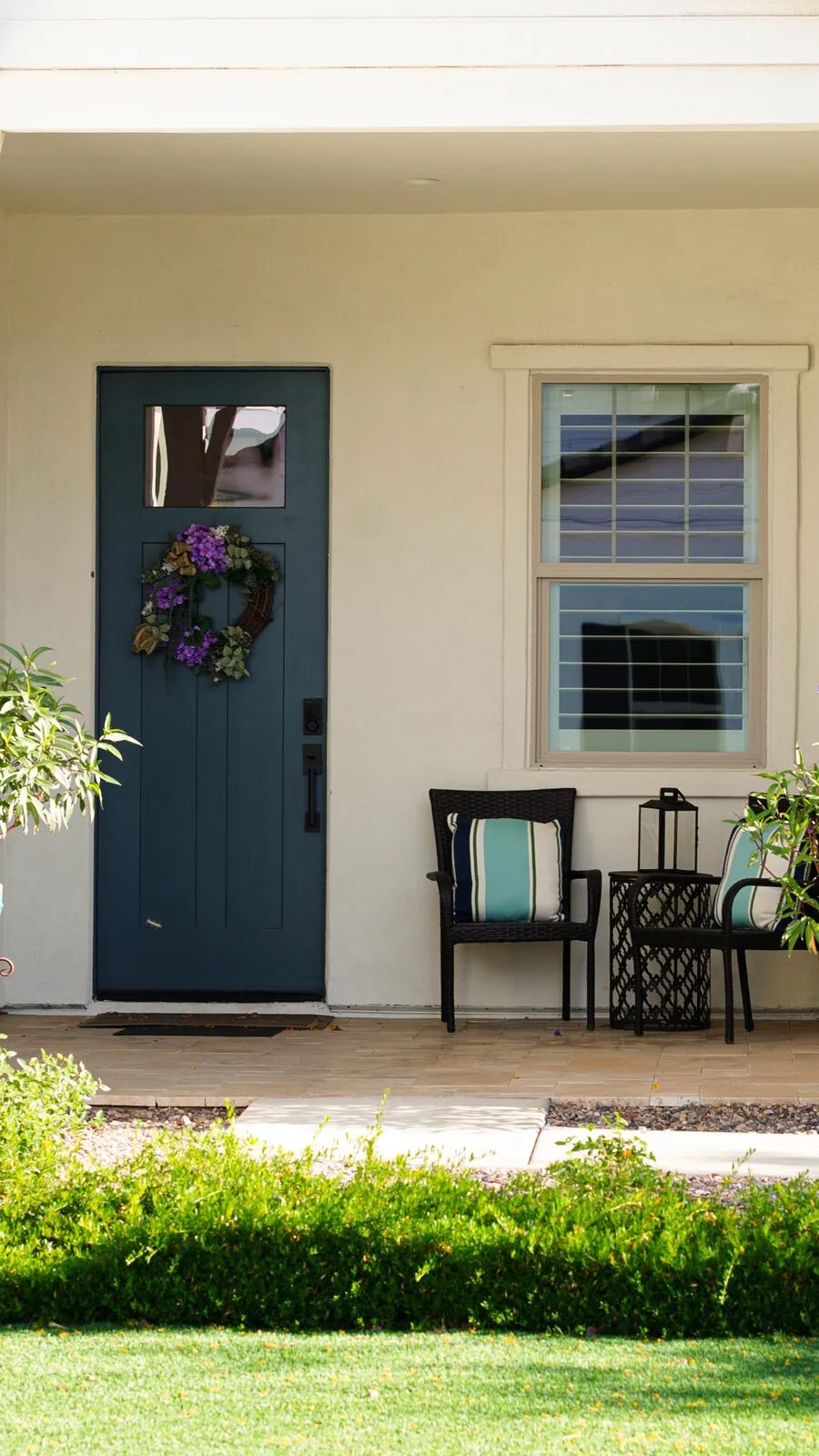Front porch of a home with clean door glass and windows